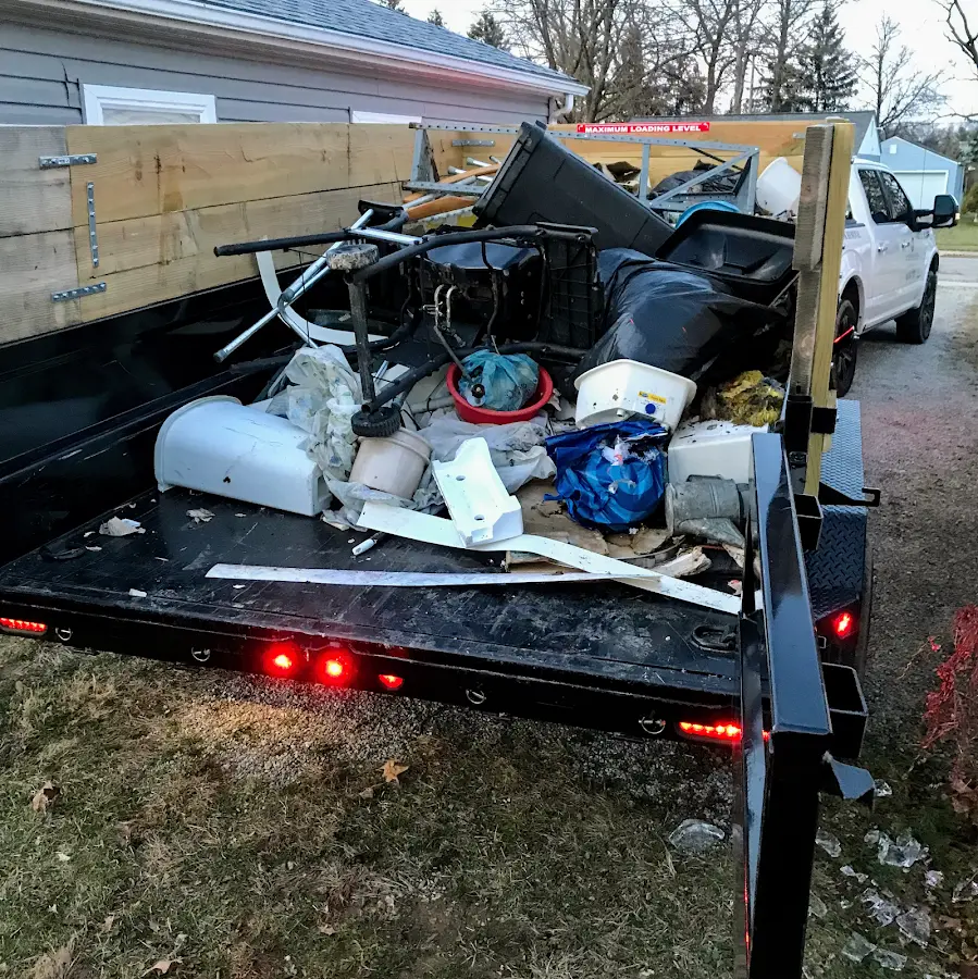Roll-off dumpster delivered to a residential driveway in Waterloo